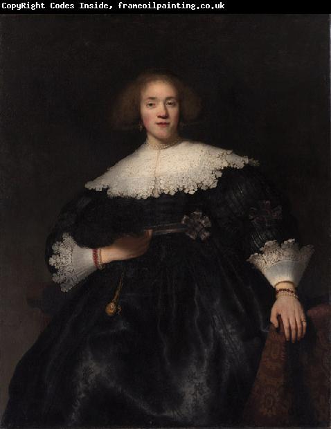 REMBRANDT Harmenszoon van Rijn Portrait of a woman with a fan (mk33)